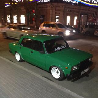 The pimped Lada, with white mags and low profile tyres.